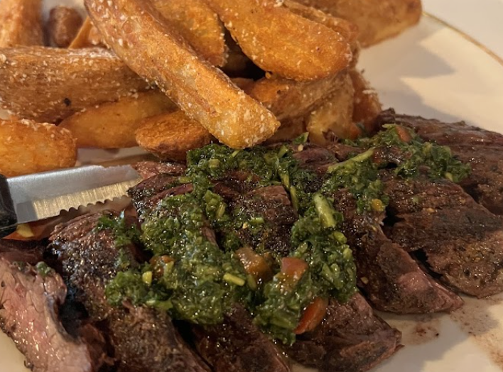 RusTeak signature dishes RusTeak BurgerCalabrian RigatoniSteak Frites